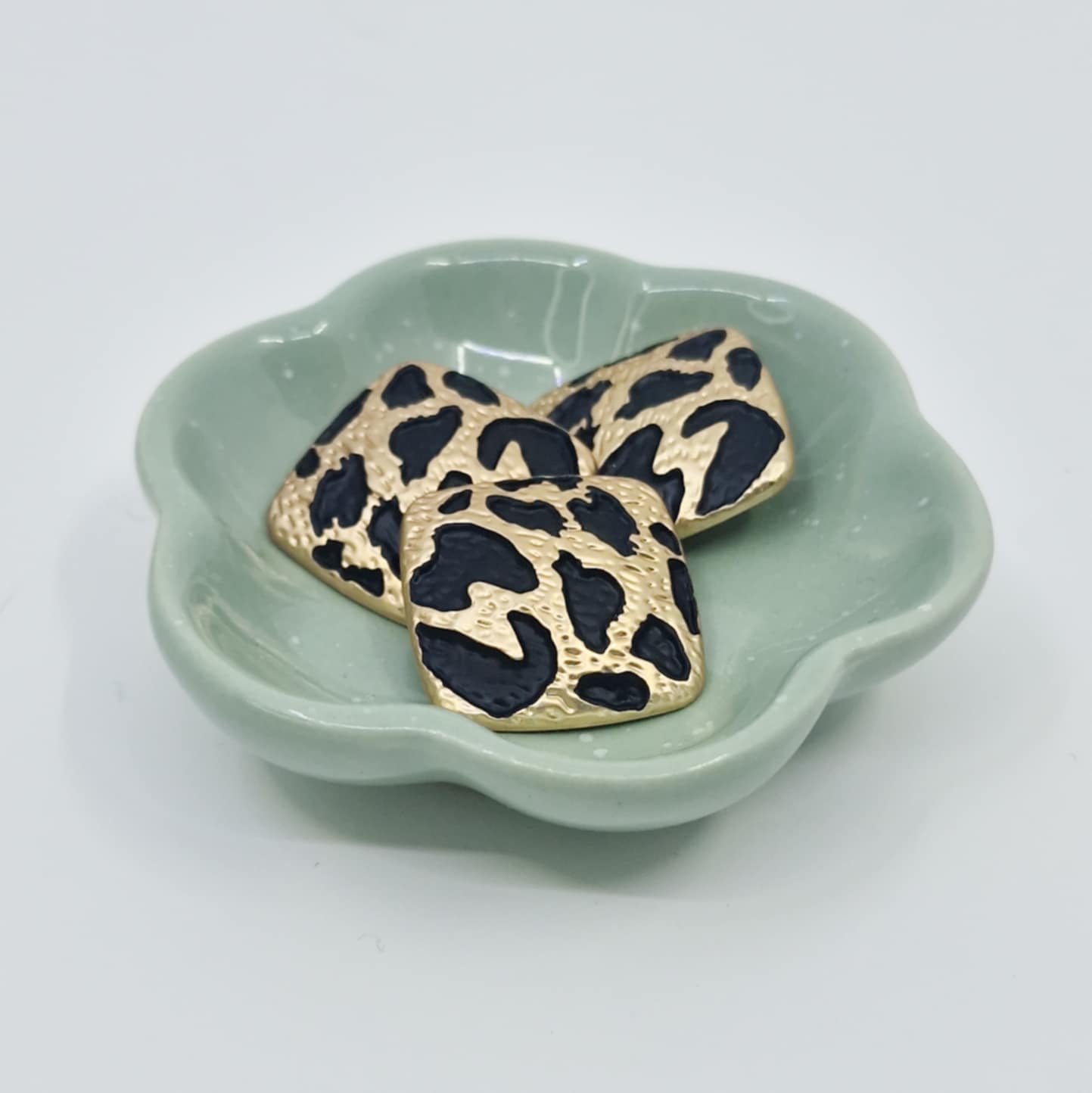 Leopardmønstret knapp