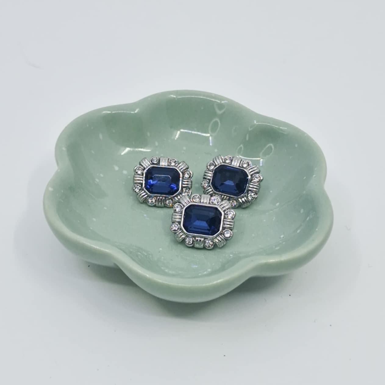 Liten firkantet knapp