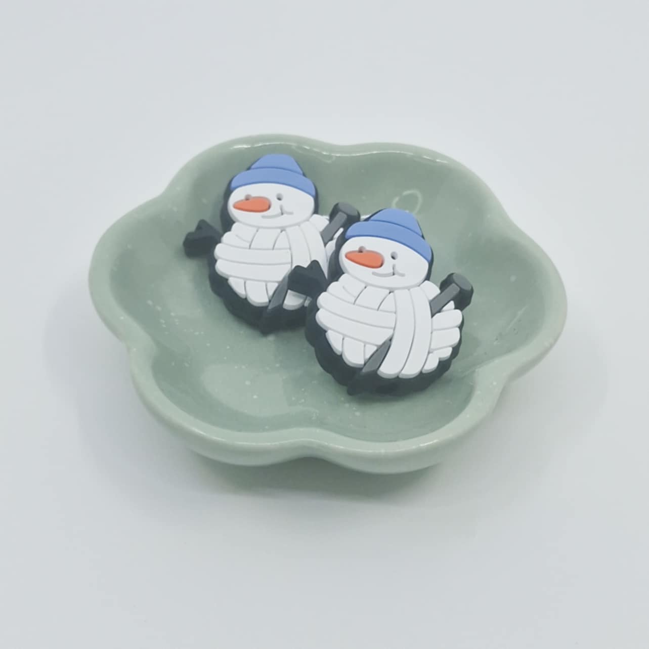 Snømann pinnestopper